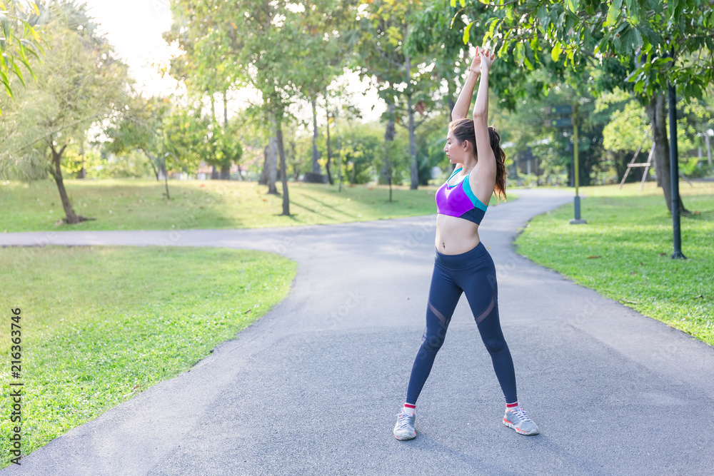 Sport background, woman is stretching and warm up, ready for running in Morning light and copy space. health and beauty concept. Sport background, woman is stretching and warm up, ready for running in Morning light and copy space. health and beauty concept.