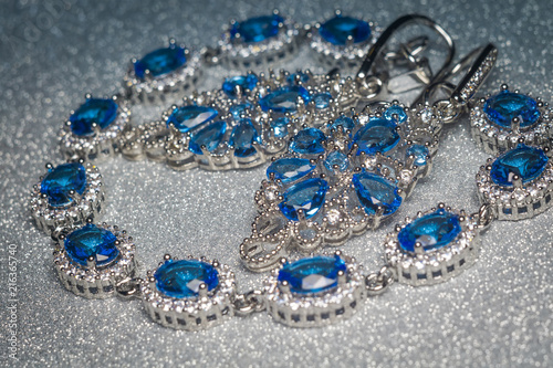 Silver bracelet and earring with tanzanite