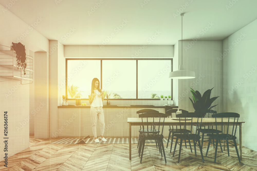Fototapeta premium Tropic view kitchen interior, woman