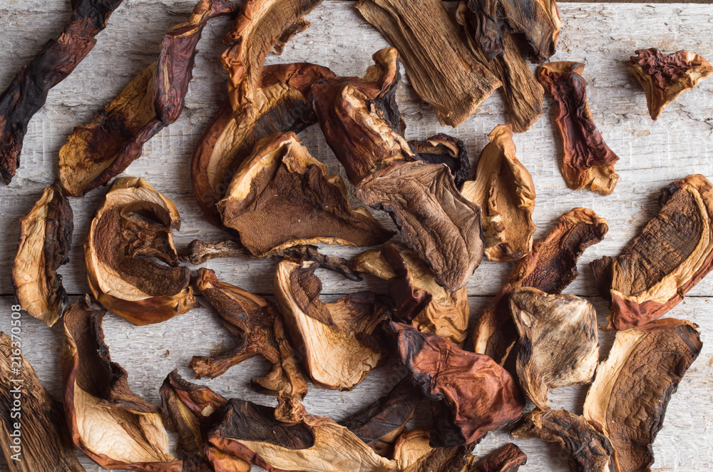 Dried mushrooms on the wooden table