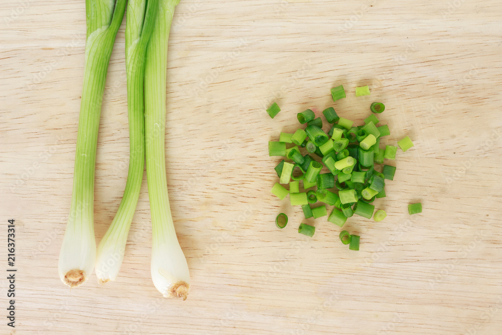 green onion cutted chives nature food on wood cutting board background green onion cutted chives nature food on wood cutting board background
