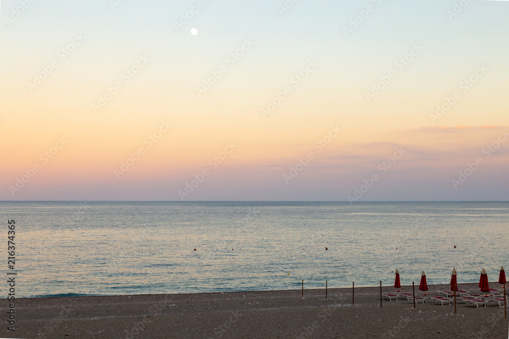 sunset and the moon