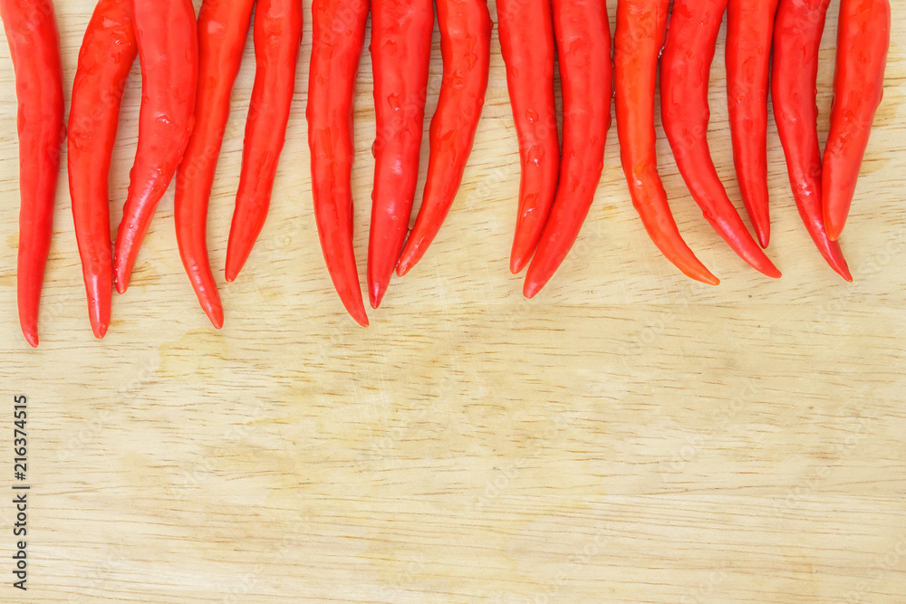 chili pepper red spicy row vegetable on wooden background chili pepper red spicy row vegetable on wooden background