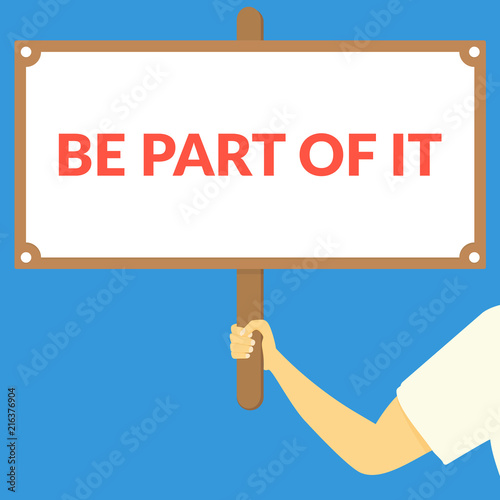 BE PART OF IT. Hand holding wooden sign