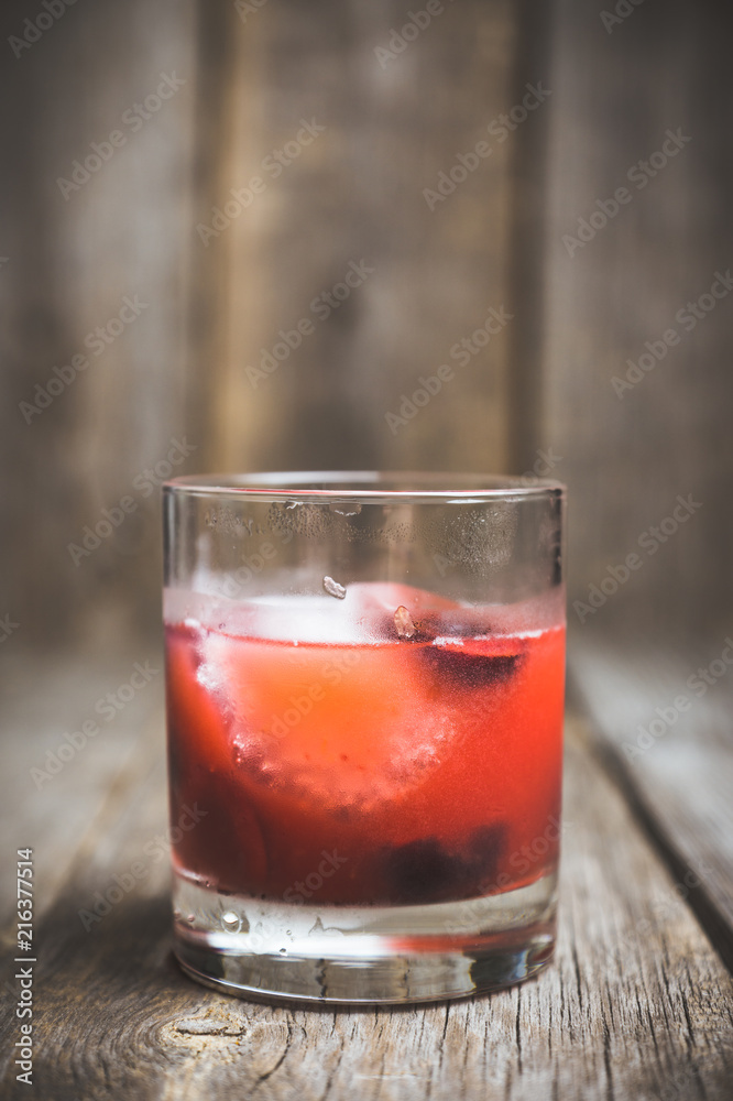 Old fashioned cocktail with cherry. Selective focus. Old fashioned cocktail with cherry. Selective focus.
