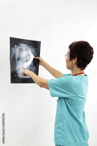 Doctors examining x-ray of chest