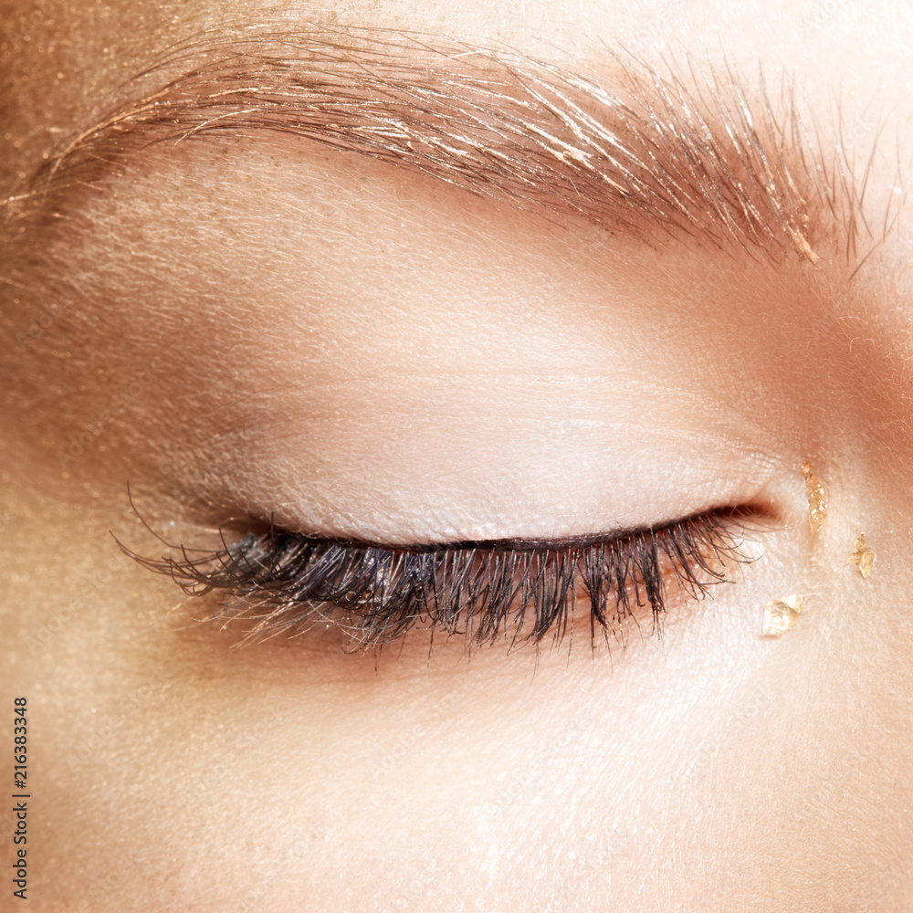 Obraz premium Female closed eyes. Closeup macro beauty portrait of young woman face