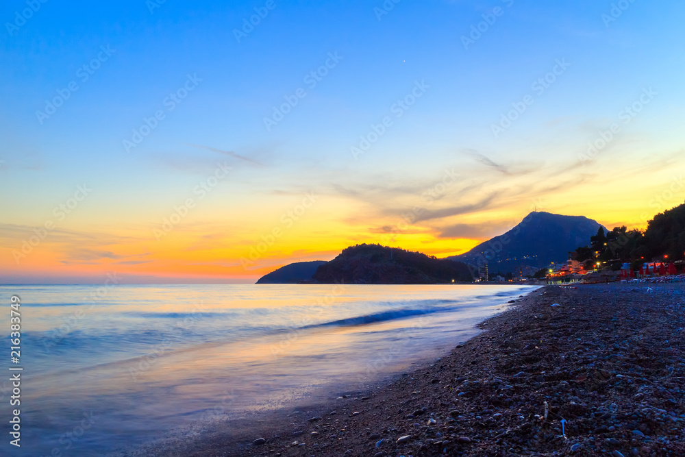 Awesome sunset on the Adriatic sea coastline in Montenegro, gorgeous seascape