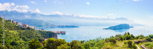 View from above to the Adriatic sea coastline and Budva city surrounded by mountains, Montenegro, panoramic view
