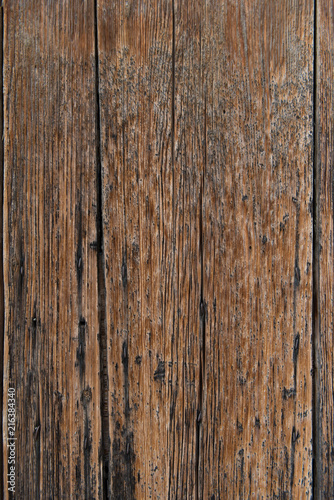 Old brown wooden background or wallpaper. Vertical image.
