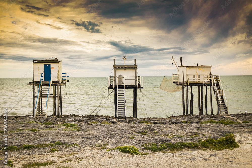 Three stilted fishing huts in Royan France
