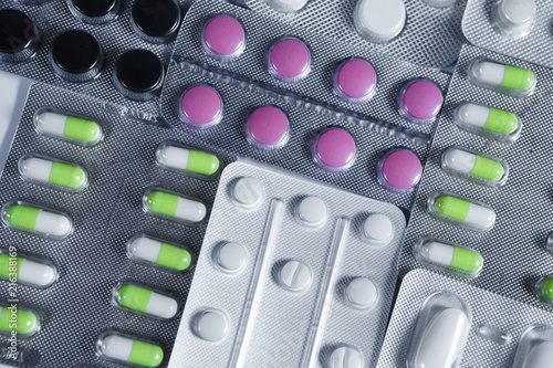 Pharmaceuticals antibiotics pills medicine. colorful antibacterials pills on white background. capsule pill medicine