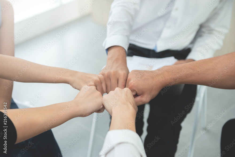 Asian business people group join the hand for collaboration and support, team work concept Asian business people group join the hand for collaboration and support, team work concept