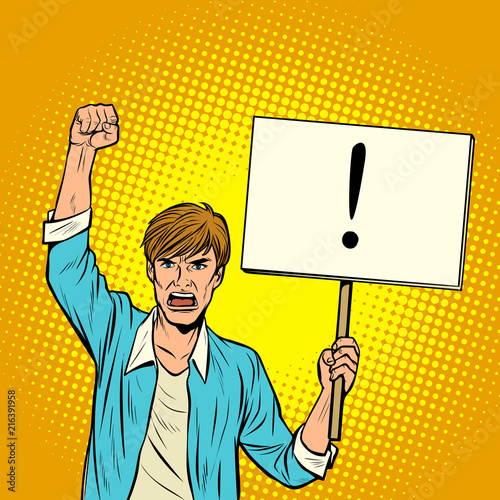 A man protests with a poster