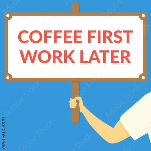 COFFEE FIRST WORK LATER. Hand holding wooden sign
