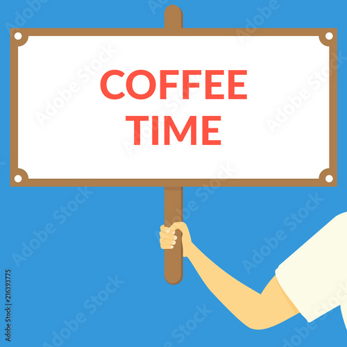 COFFEE TIME. Hand holding wooden sign