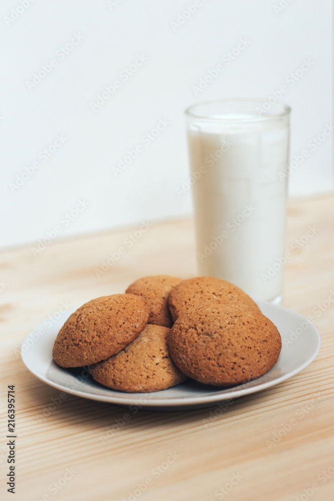 Cookies with a glass of milk on the table. Cookies with a glass of milk on the table.