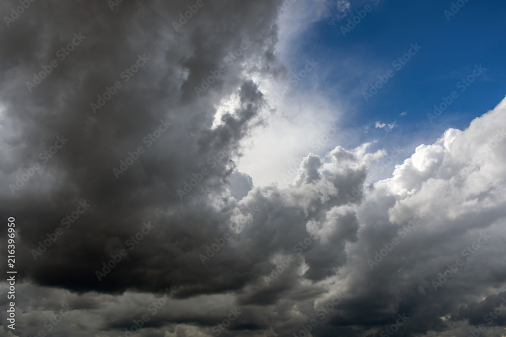 White fluffy clouds against a blue sky