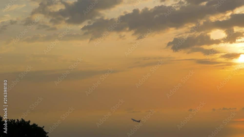 plane departures on sunset orange sky plane departures on sunset orange sky