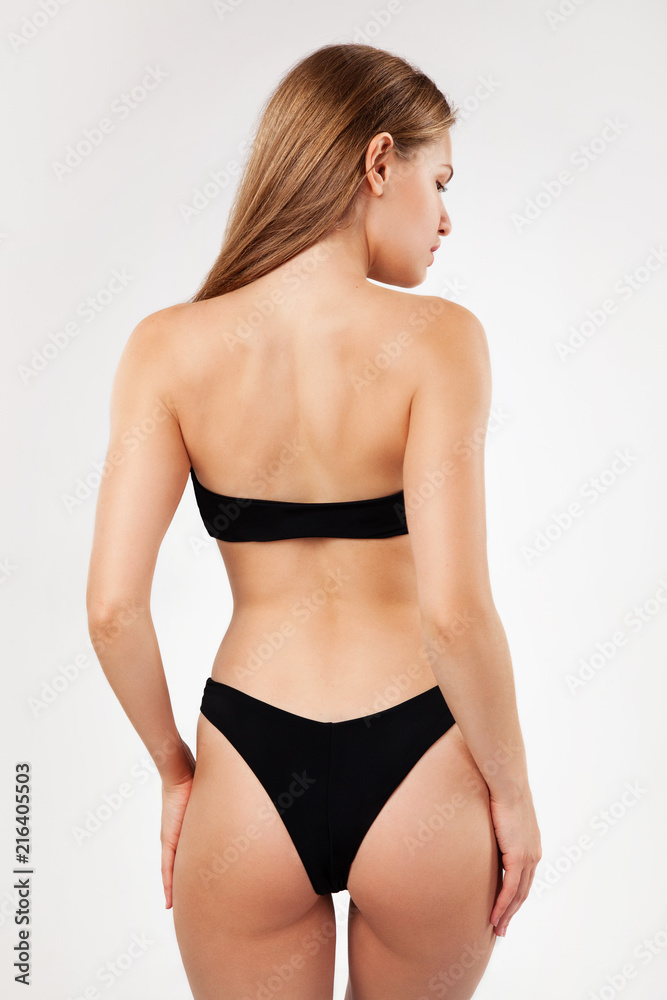 Fototapeta premium Beautiful woman in black bikini