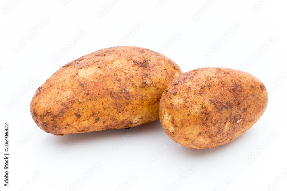 A bio russet potato isolated white background. A bio russet potato isolated white background.