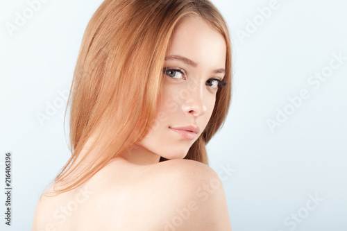 Young beautiful girl with clean perfect skin close-up
