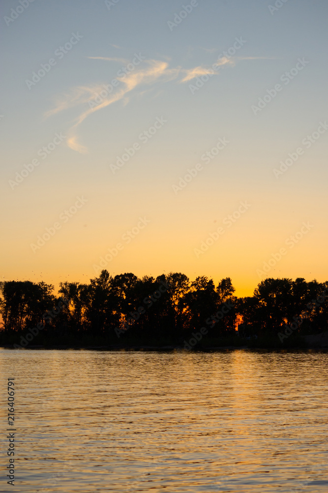 Fototapeta premium Beautiful sunset on the river