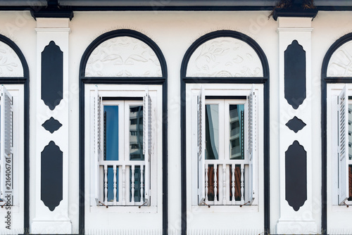 Colorful wooden window Colonial style architecture building in Little India  Singapore City.