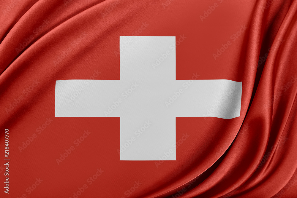 Fototapeta premium Switzerland flag with a glossy silk texture.