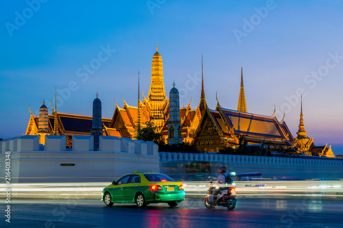 Taxi and motorbike in the middle of the Grand Palace junction, Wat Phra Kaew