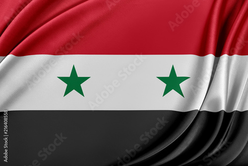 Syria flag with a glossy silk texture. photo