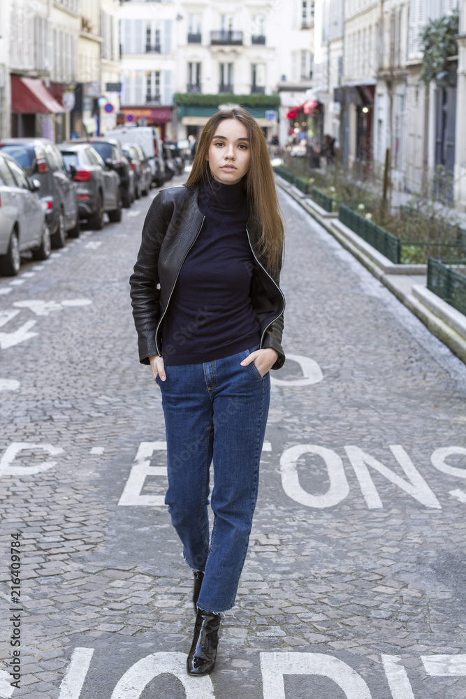 Fashion portrait of young beautiful woman in Paris.