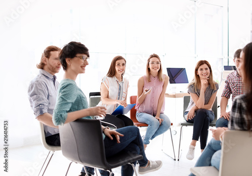 Young people having business training in office