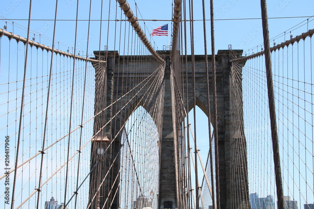 Fototapeta premium Brooklyn Bridge and the American Flag