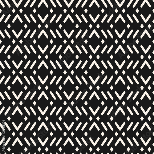 Vector geometric seamless pattern with zig zag lines  stripes  rhombuses. Modern abstract black and white repeat texture. Stylish dark monochrome background in ethnic style. Repeat design element