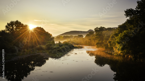 Sunrise over River Chassezac in the Ardeche, France photo