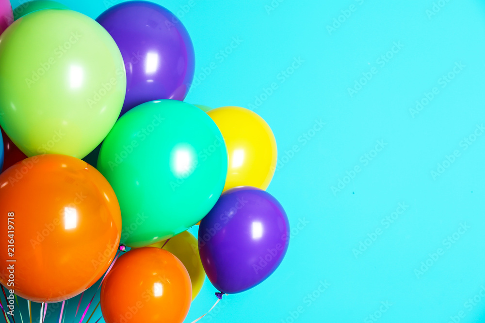 Bunch of bright balloons on color background with space for design Bunch of bright balloons on color background with space for design