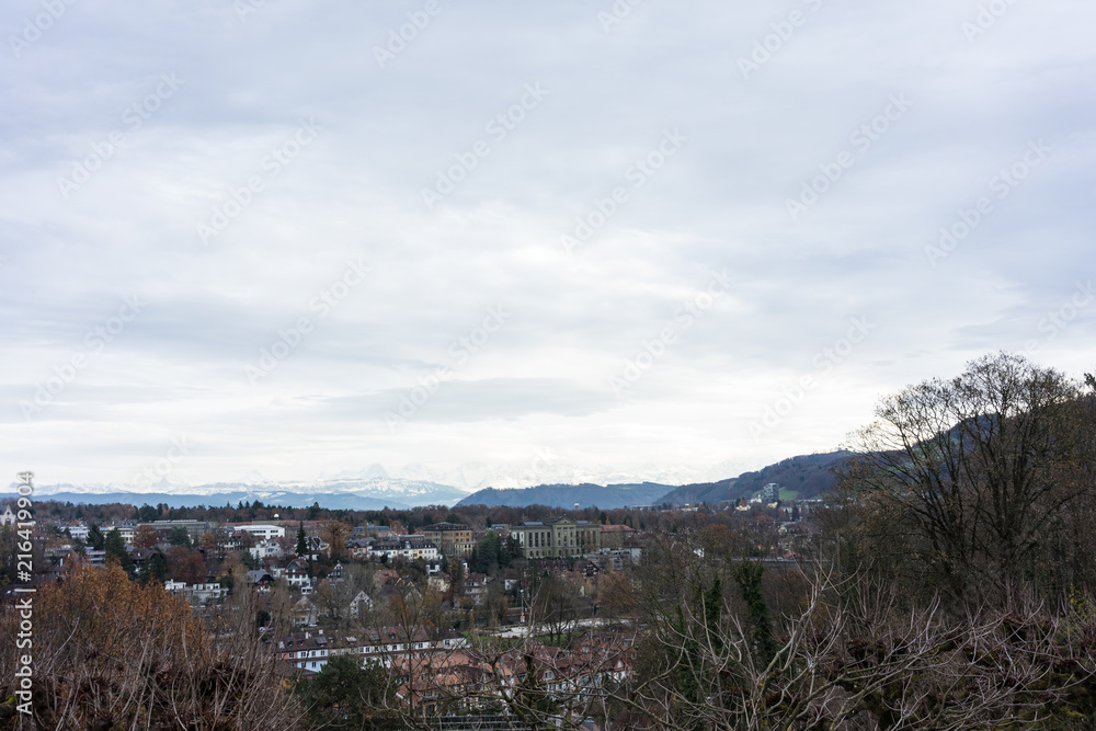 city of bern with snow mountain alps in background