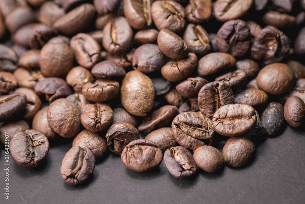 Close up of coffee beans are the background. Close up of coffee beans are the background.