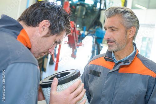 inspecting a mechanism photo