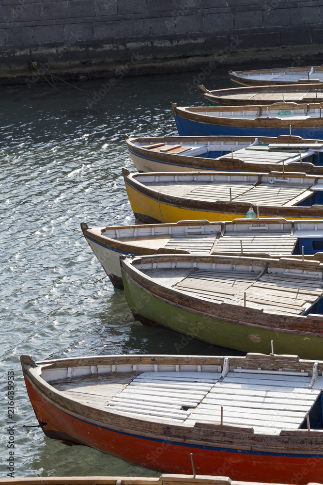 Row of boats anchored in the Bay of Naples, Campania, Italy