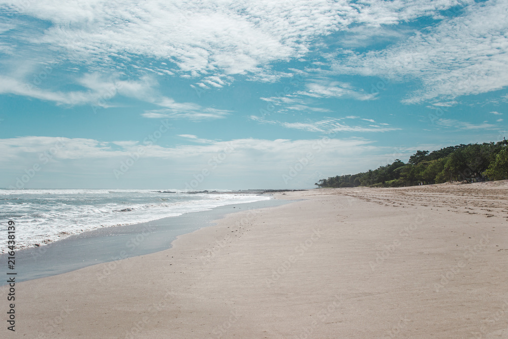 Beautiful paradise white sand beach of Playa Carmen, near Santa Teresa on the Nicoya peninsula of Costa Rica