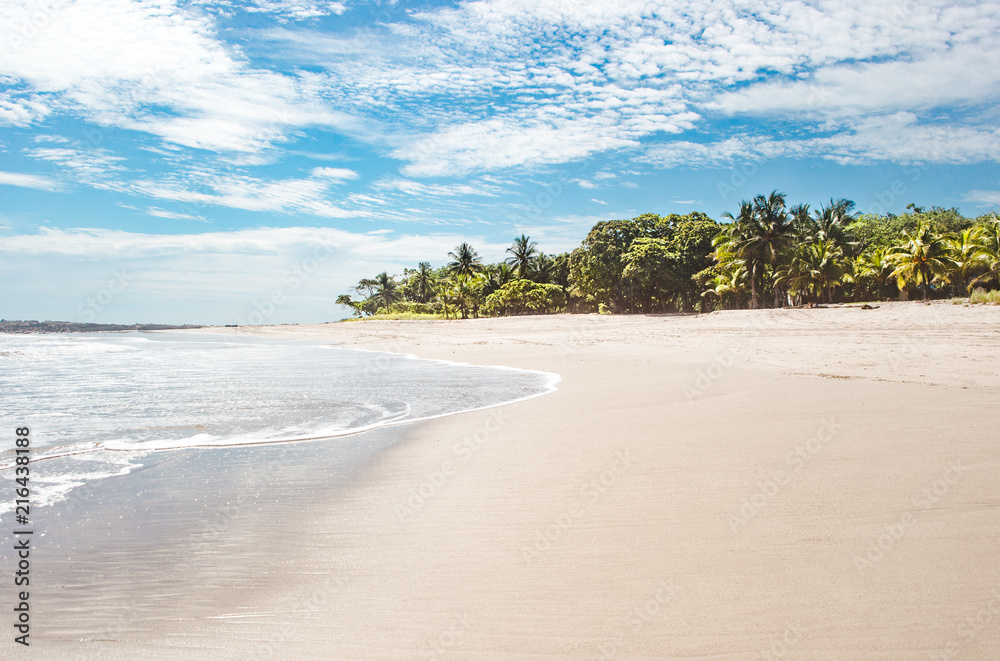 Beautiful paradise white sand beach of Playa Carmen, near Santa Teresa on the Nicoya peninsula of Costa Rica Beautiful paradise white sand beach of Playa Carmen, near Santa Teresa on the Nicoya peninsula of Costa Rica