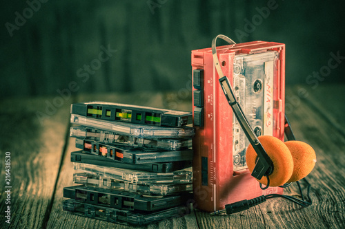 Canvas Print Antique cassette tape with headphones and walkman