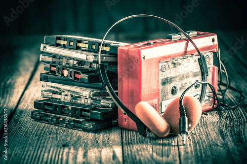 Photos Classic cassette tape with headphones and walkman