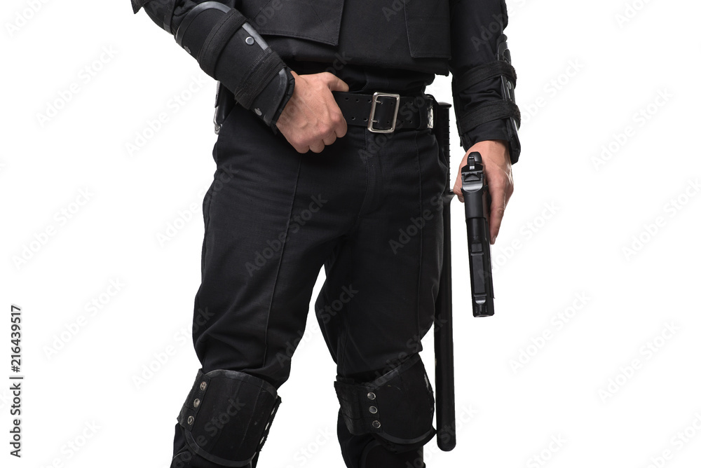 Armed special force soldier in black uniform