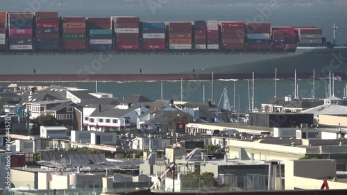  International Trade. A Large Container Ship is passing San Francisco Fisherman's Wharf on it's way to Oakland Port.