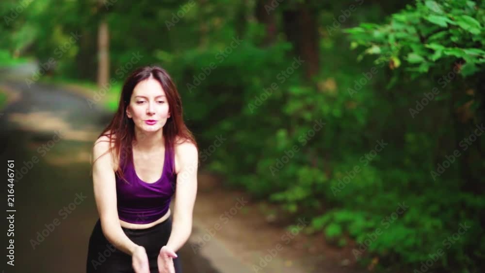 Girl runs through park in the morning Girl runs through park in the morning