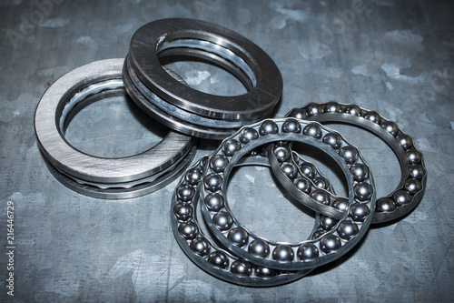 Industrial bearings and ball cages for rolls or wheels