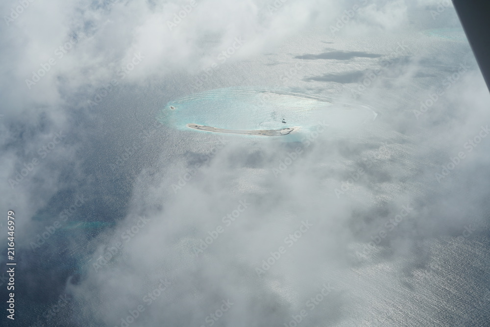 Obraz premium Aerial view from a seaplane in The Maldives